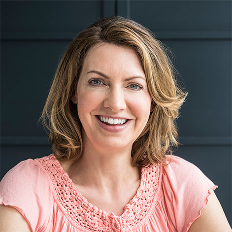 Portrait of a woman wearing a pink crochet top